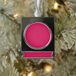a pink background with a white border silver plated banner ornament