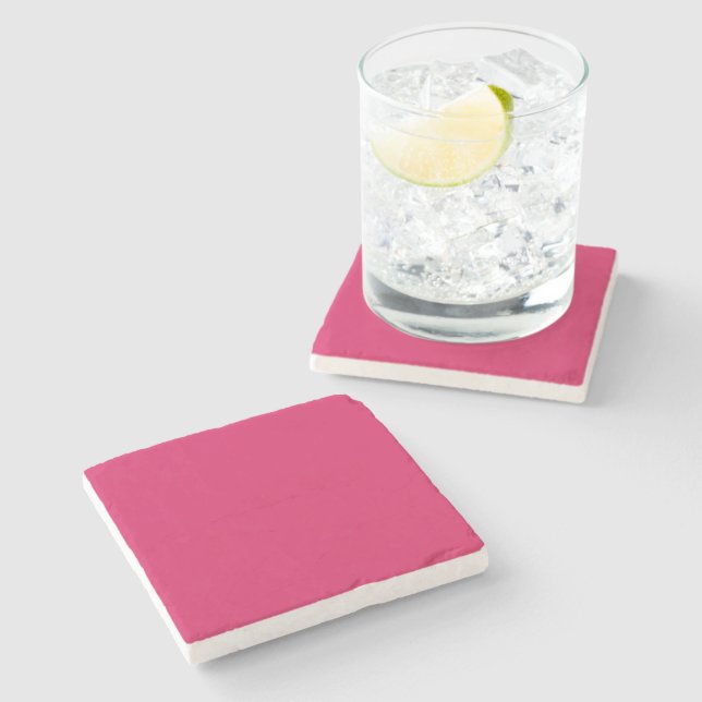 a pink background with a white border stone coaster (Side)