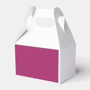 a pink background with a white favour box