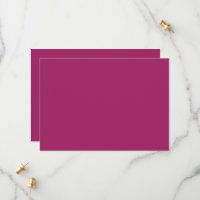 a pink background with a white