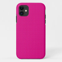 a pink background with white polka dots