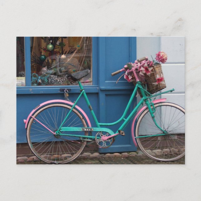 A pink bicycle with wicker basket and flowers postcard (Front)