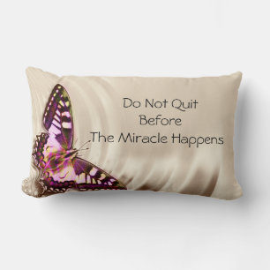 A pink butterfly on a cream satin background lumbar cushion