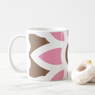 a pink flower on a brown background coffee mug