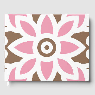 a pink flower on a brown background guest book