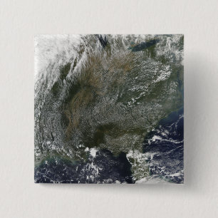 A pinwheel-like pattern of high pressure clouds 15 cm square badge