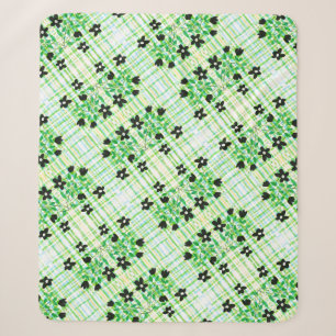A Plaid And Flowered Blanket