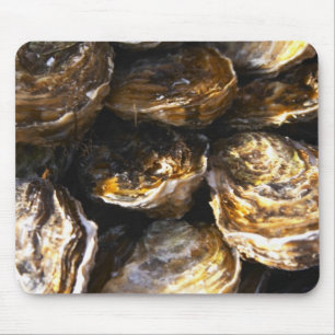 A plate of oysters. mouse pad