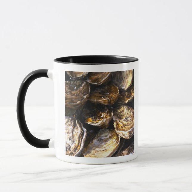 A plate of oysters. mug (Left)