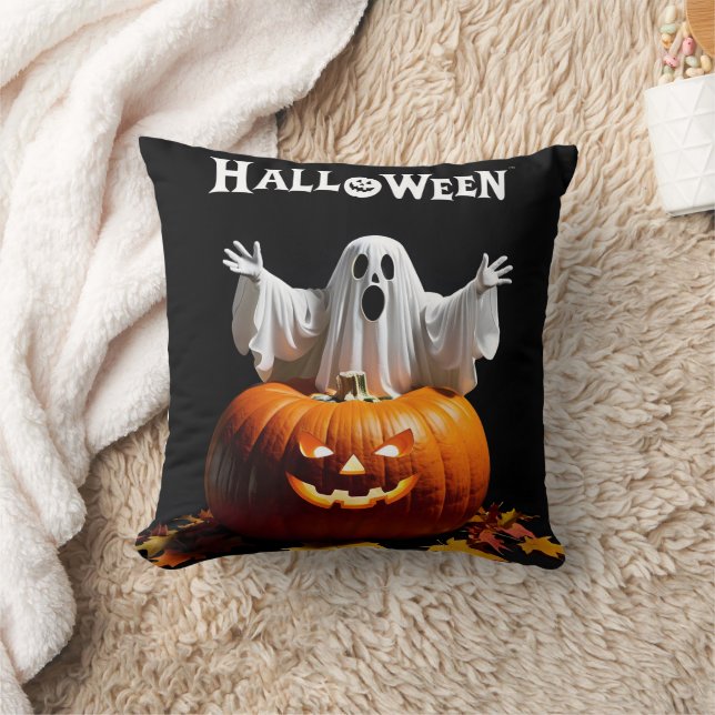 A playful ghost emerges from a carved pumpkin cushion (Blanket)