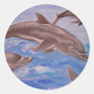 A Pod of Playful Jumping Dolphins Classic Round Sticker