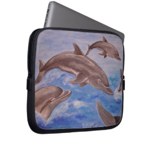 A Pod of Playful Jumping Dolphins Laptop Sleeve