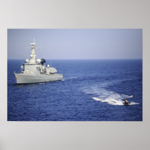 A Portuguese navy team in an inflatable boat Poster