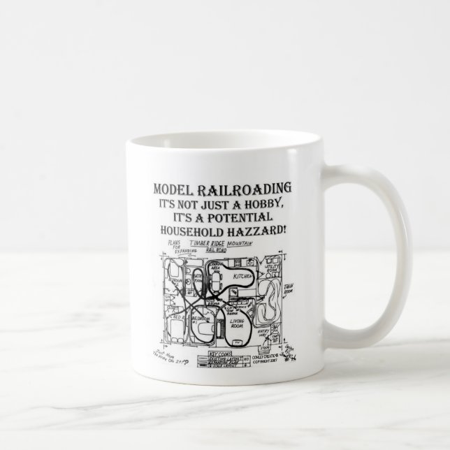 A POTENTIAL HOUSEHOLD HAZZARD MUG (Right)