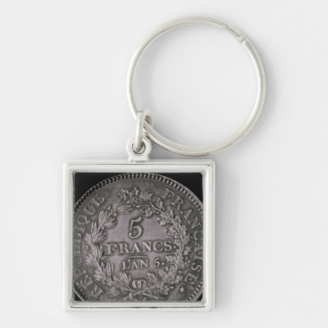 A pound of twenty sols key ring (Front)