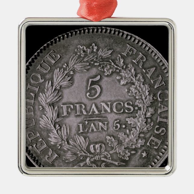 A pound of twenty sols metal ornament (Front)