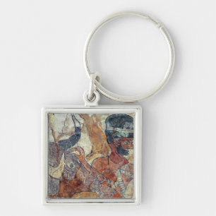 A priest leading a bull to sacrifice key ring