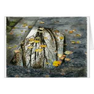 A puddle on the street in November