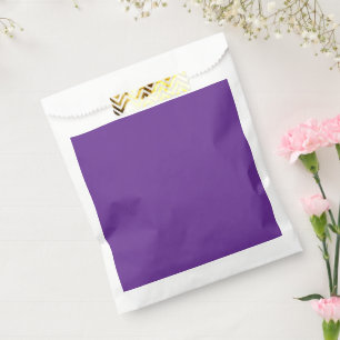 a purple background with a favour bag