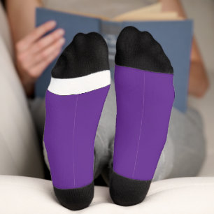 a purple background with a socks