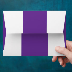 a purple background with a white border envelope