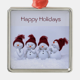 A quartet of snowmen metal ornament