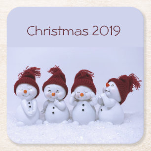 A quartet of snowmen square paper coaster