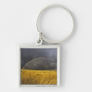 A rainbow appearing through a misty after noon key ring