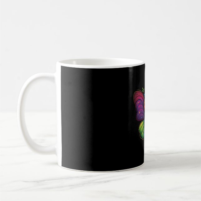 A rainbow-coloured-butterfly coffee mug (Left)