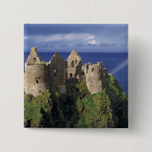 A rainbow strikes mediaeval Dunluce Castle on 15 Cm Square Badge