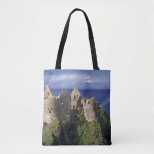 A rainbow strikes mediaeval Dunluce Castle Tote Bag