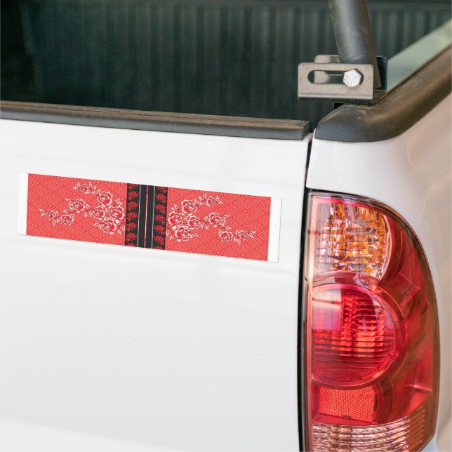 a red and black pattern with flowers on it bumper sticker (On Truck)