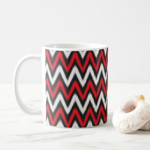 a red and black zigzag pattern on a white backgrou coffee mug