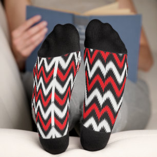 a red and black zigzag pattern on a white backgrou socks
