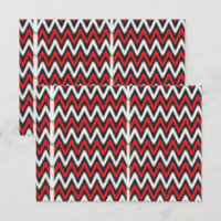 a red and black zigzag pattern on a white backgrou