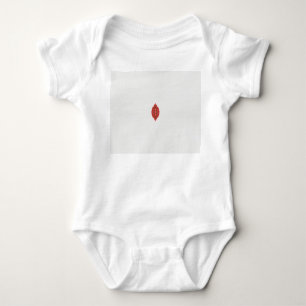 a red and brown design on a white background baby bodysuit