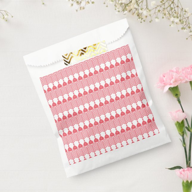 A red and pink geometric pattern featuring interlo favour bag (Sealed)