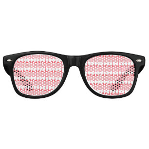 A red and pink geometric pattern featuring interlo retro sunglasses