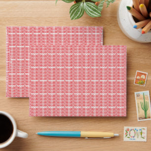 a red and white background with small squares envelope