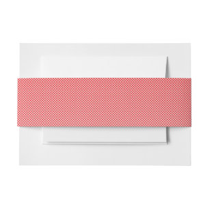 a red and white background with small squares invitation belly band