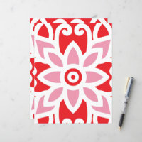 a red and white pattern with a flower on it