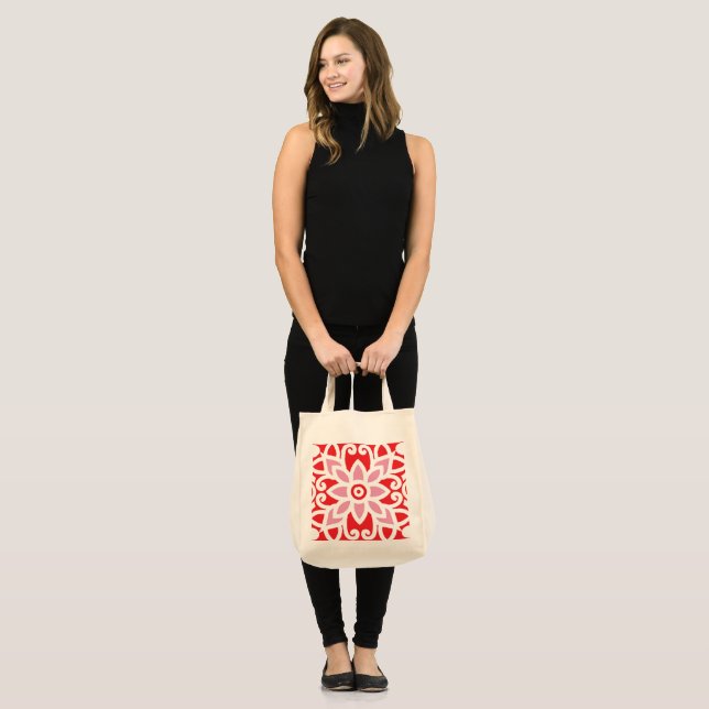 a red and white pattern with a flower on it tote bag (Front (Model))
