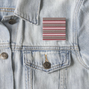 a red and white striped pattern 15 cm square badge