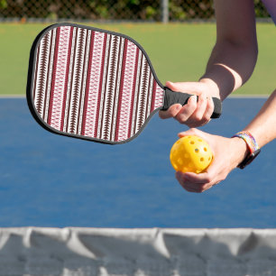 a red and white striped pattern pickleball paddle