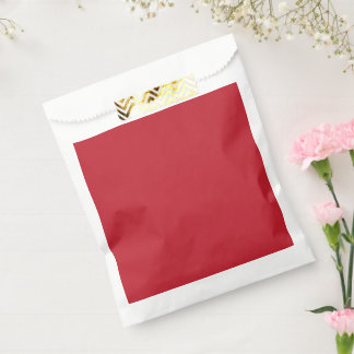 a red background with a favour bag