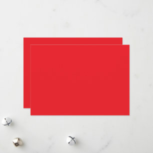 a red background with a white border holiday card