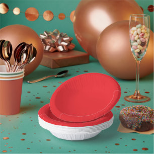 a red background with a white border paper plate