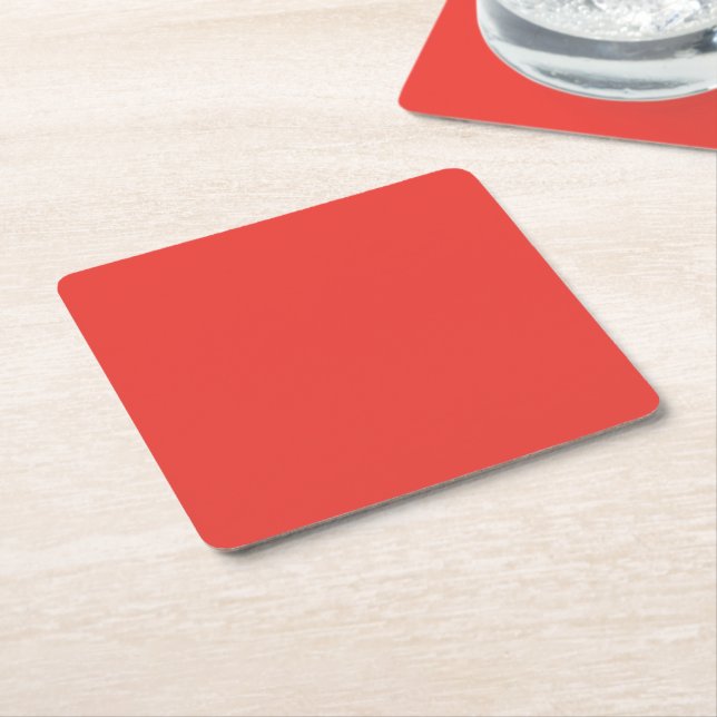 a red background with a white border square paper coaster (Angled)