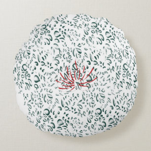 a red flower on a black background round cushion