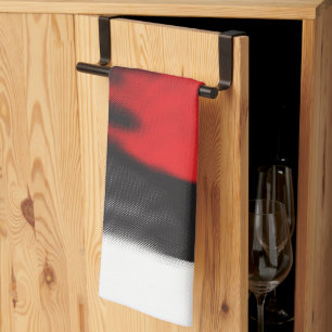A red graphic design featuring bold geometric shap tea towel